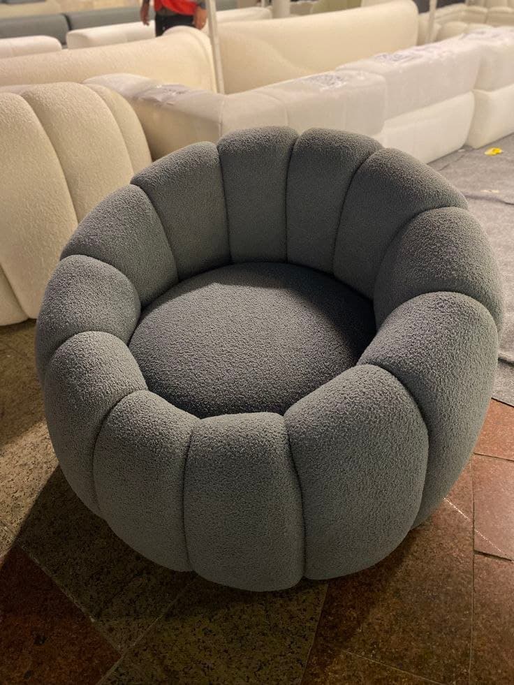 Grey bouclé round channel armchair